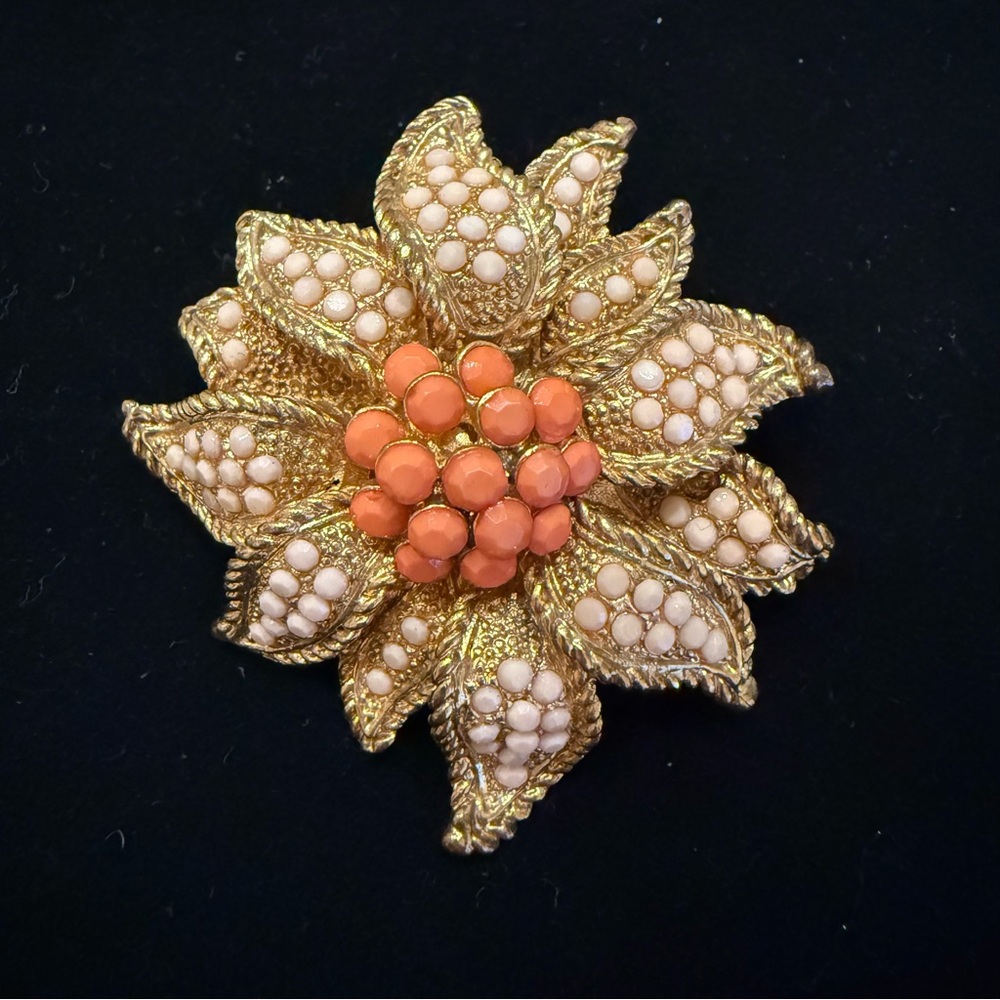 Beautiful faux coral gold tone floral brooch